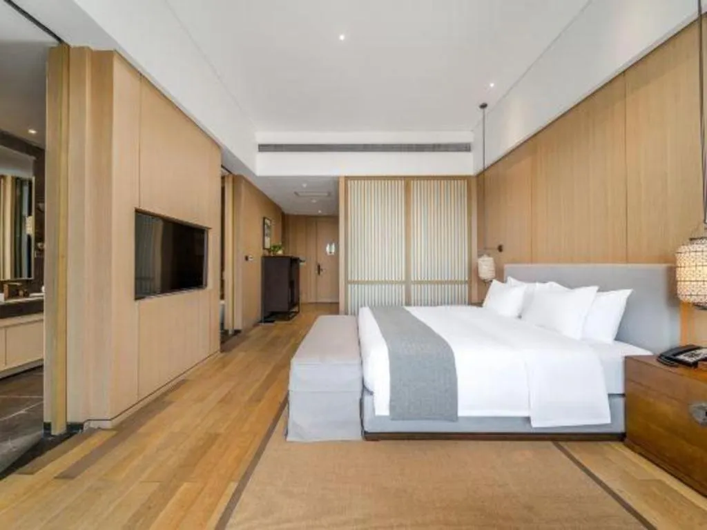 Bed in Jolie Vue Boutique Hotel Sanjiang