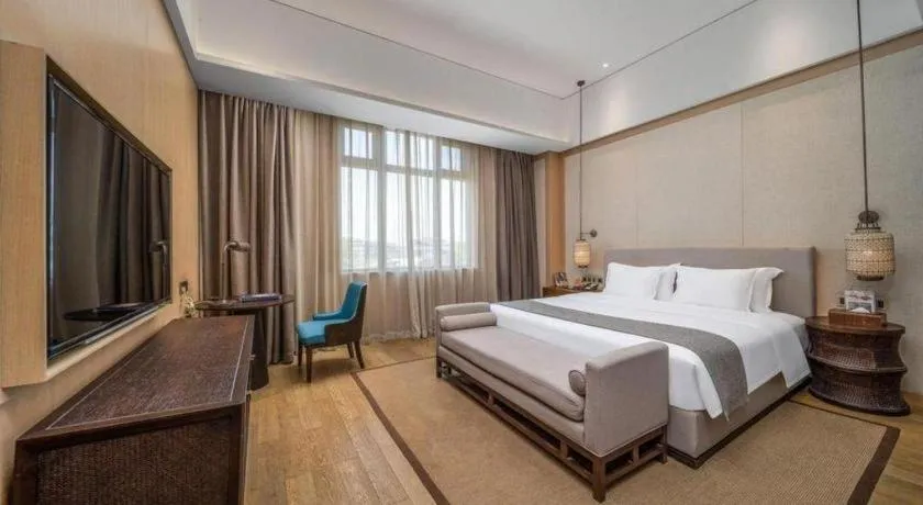 Bed in Jolie Vue Boutique Hotel Sanjiang