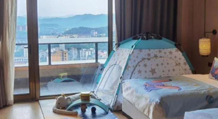 Bed in Jolie Vue Boutique Hotel Sanjiang
