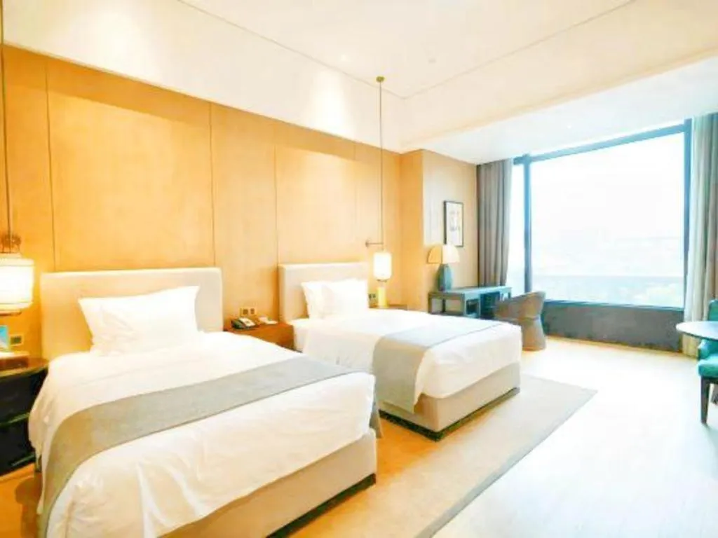 Bed in Jolie Vue Boutique Hotel Sanjiang