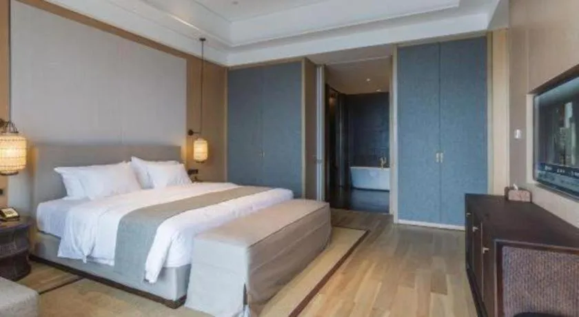 Bed in Jolie Vue Boutique Hotel Sanjiang