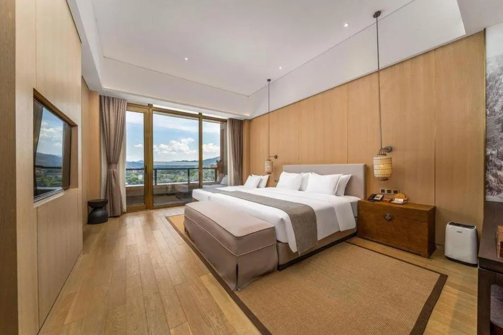 Bed in Jolie Vue Boutique Hotel Sanjiang