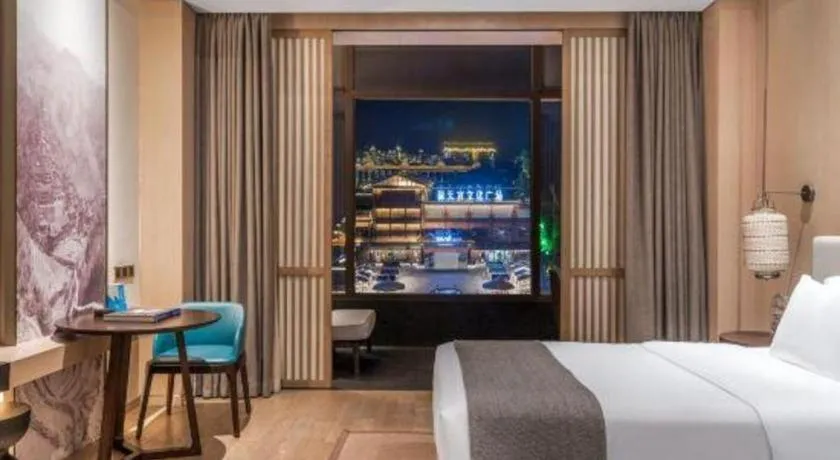 Bed in Jolie Vue Boutique Hotel Sanjiang