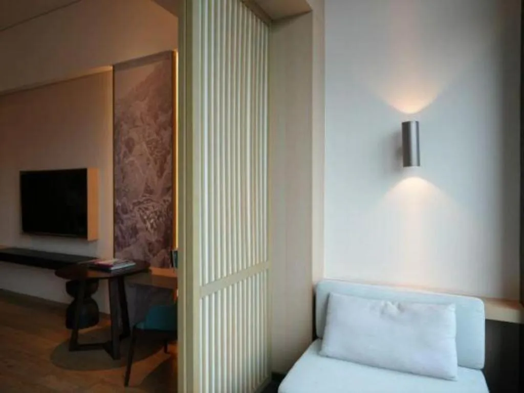 Bed in Jolie Vue Boutique Hotel Sanjiang