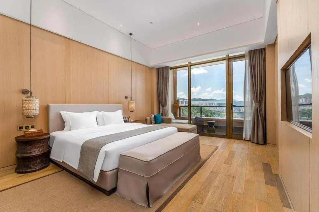 Bed in Jolie Vue Boutique Hotel Sanjiang