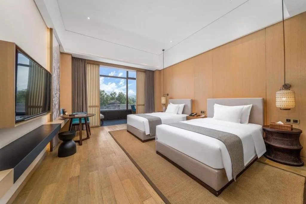 Bed in Jolie Vue Boutique Hotel Sanjiang