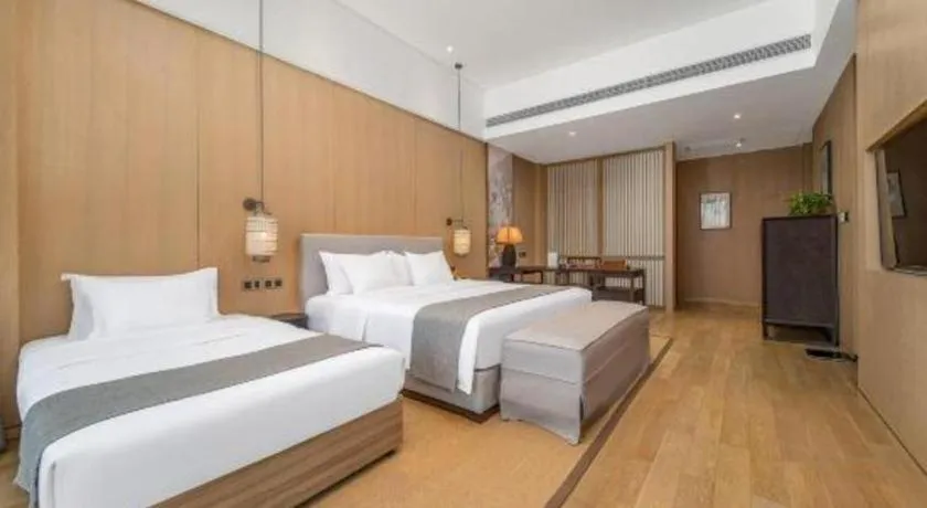 Bed in Jolie Vue Boutique Hotel Sanjiang