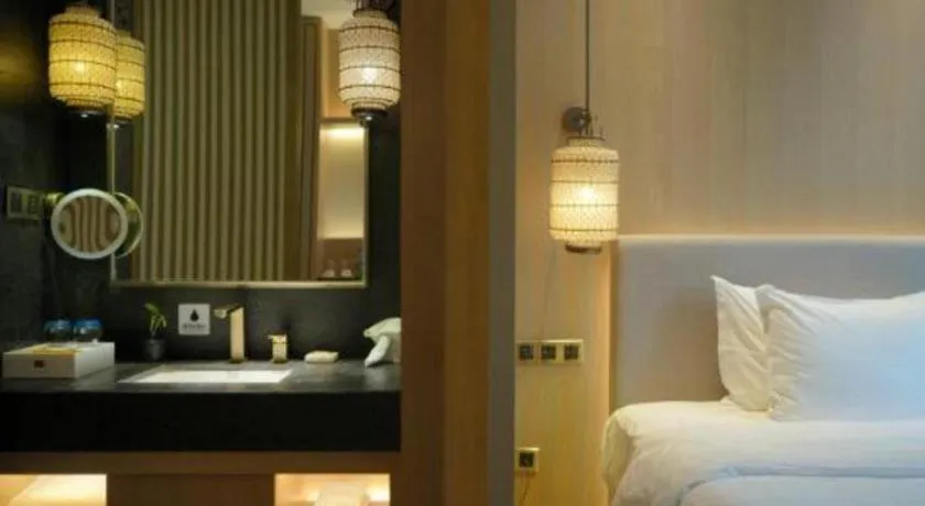 Bed in Jolie Vue Boutique Hotel Sanjiang