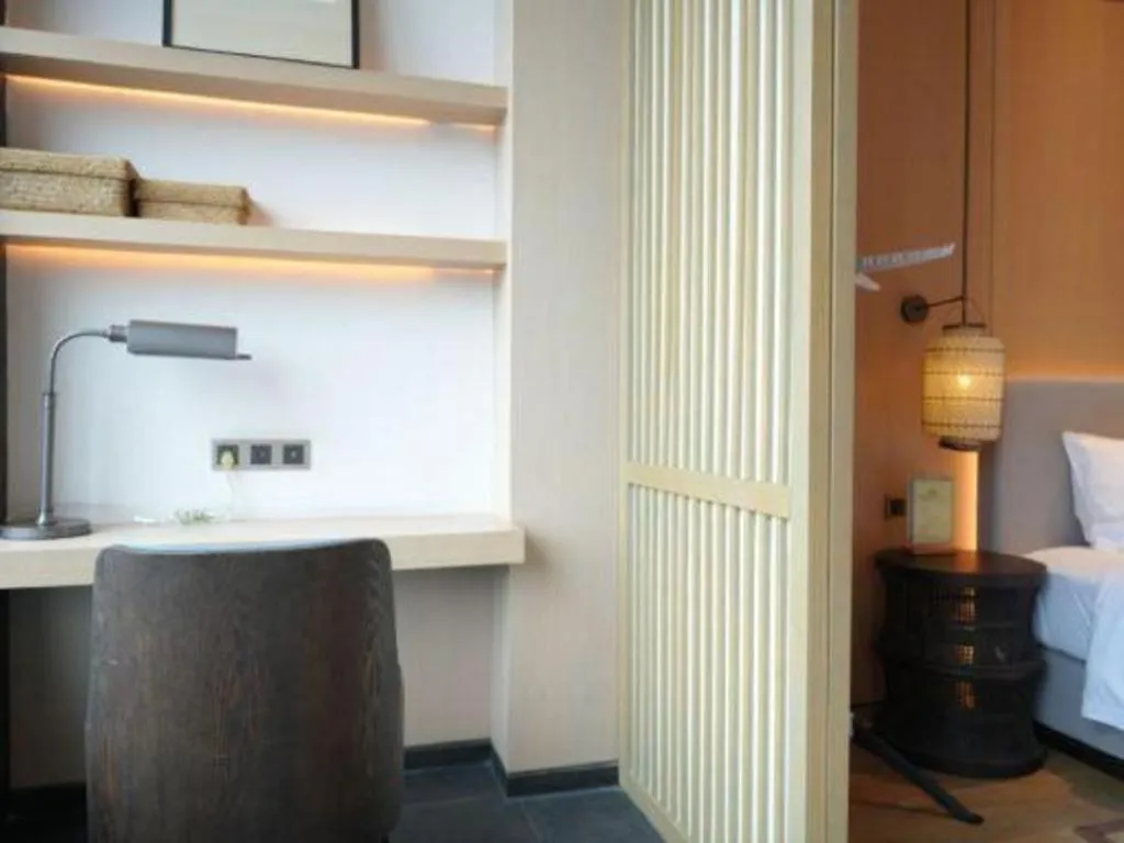 Bed in Jolie Vue Boutique Hotel Sanjiang