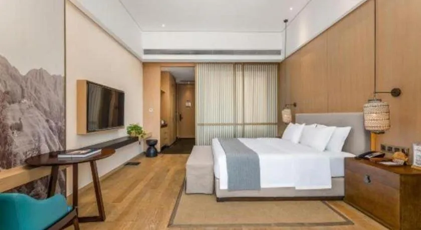 Bed in Jolie Vue Boutique Hotel Sanjiang