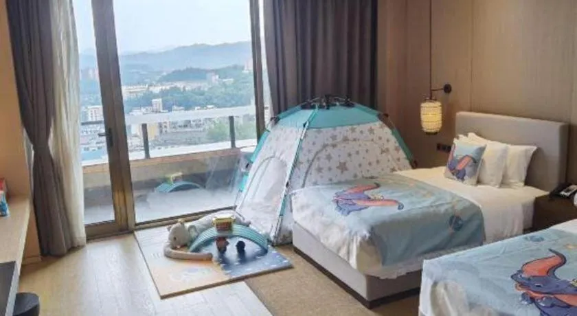 Bed in Jolie Vue Boutique Hotel Sanjiang