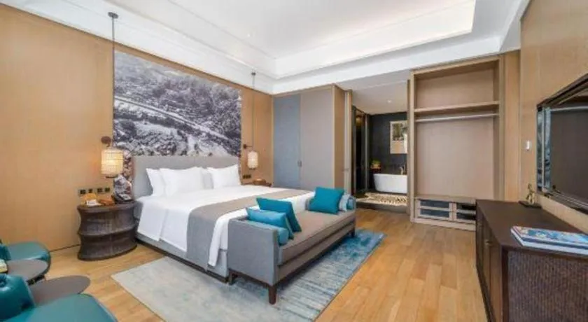 Bed in Jolie Vue Boutique Hotel Sanjiang