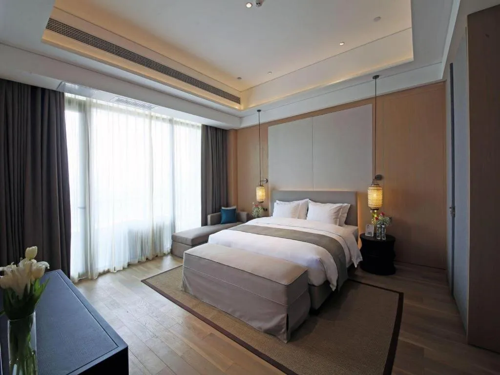 Bed in Jolie Vue Boutique Hotel Sanjiang