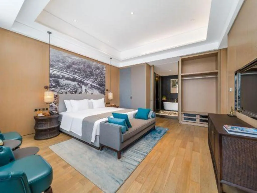 Bed in Jolie Vue Boutique Hotel Sanjiang
