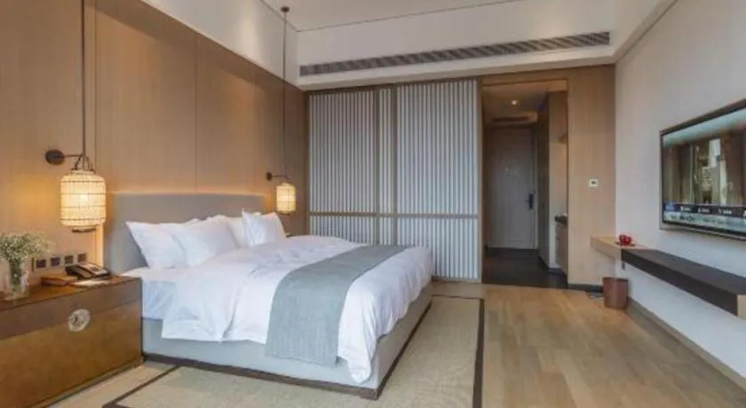 Bed in Jolie Vue Boutique Hotel Sanjiang