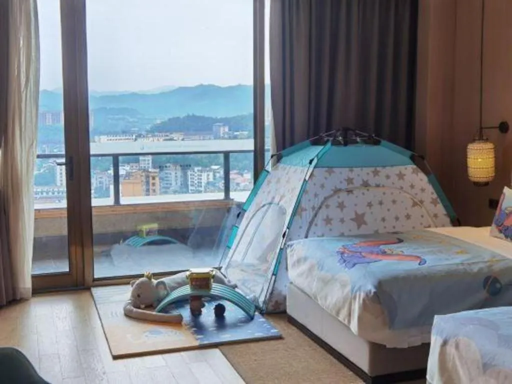 Bed in Jolie Vue Boutique Hotel Sanjiang