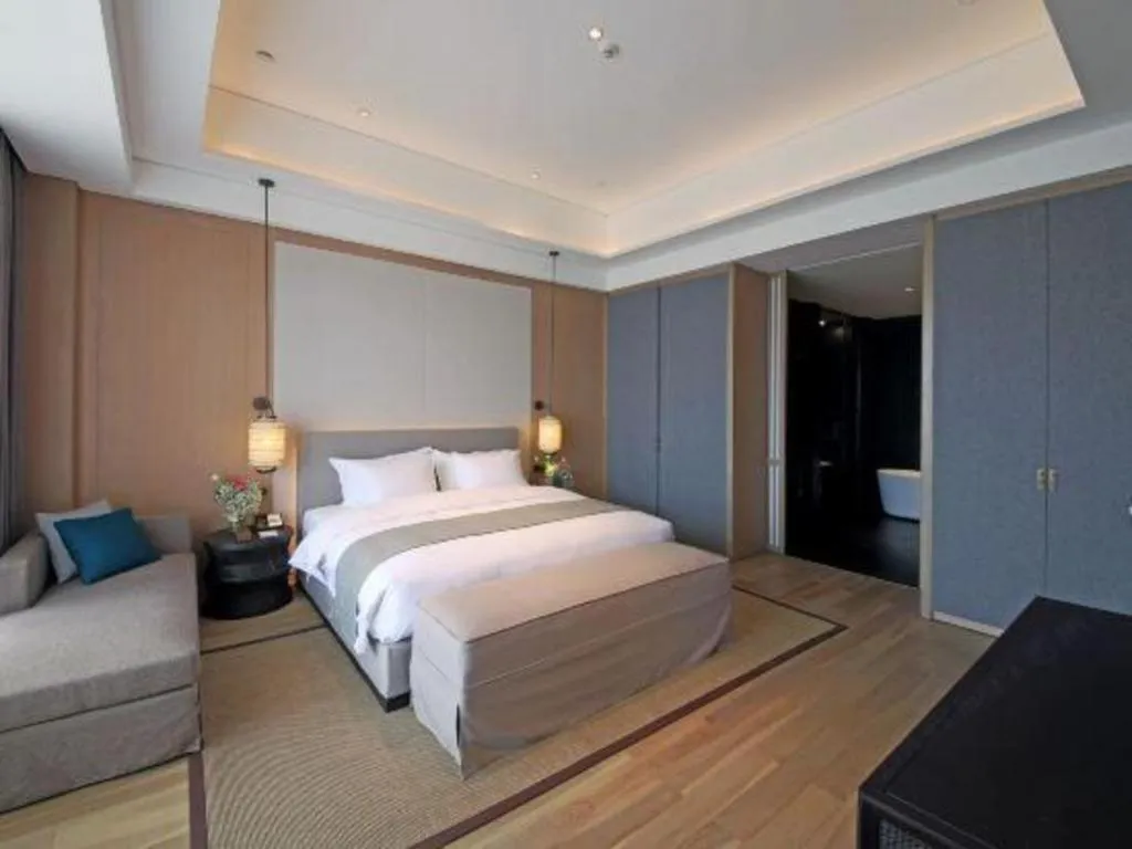 Bed in Jolie Vue Boutique Hotel Sanjiang
