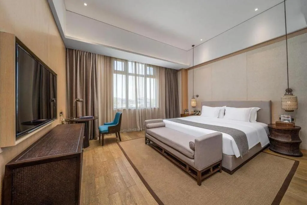 Bed in Jolie Vue Boutique Hotel Sanjiang