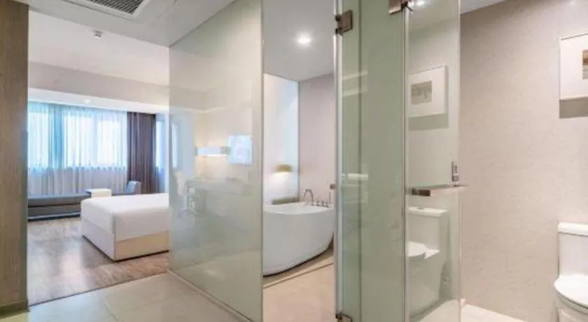 Bed in Jinjiang Metropolo Hotel - Hangzhou Xiasha