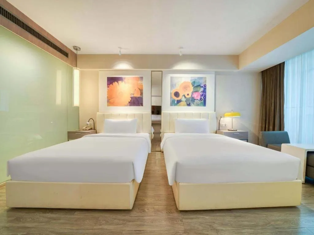 Bed in Jinjiang Metropolo Hotel - Hangzhou Xiasha