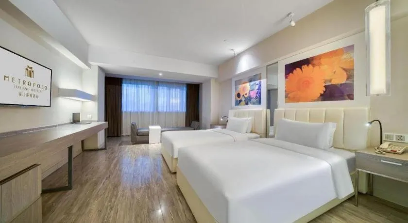 Bed in Jinjiang Metropolo Hotel - Hangzhou Xiasha