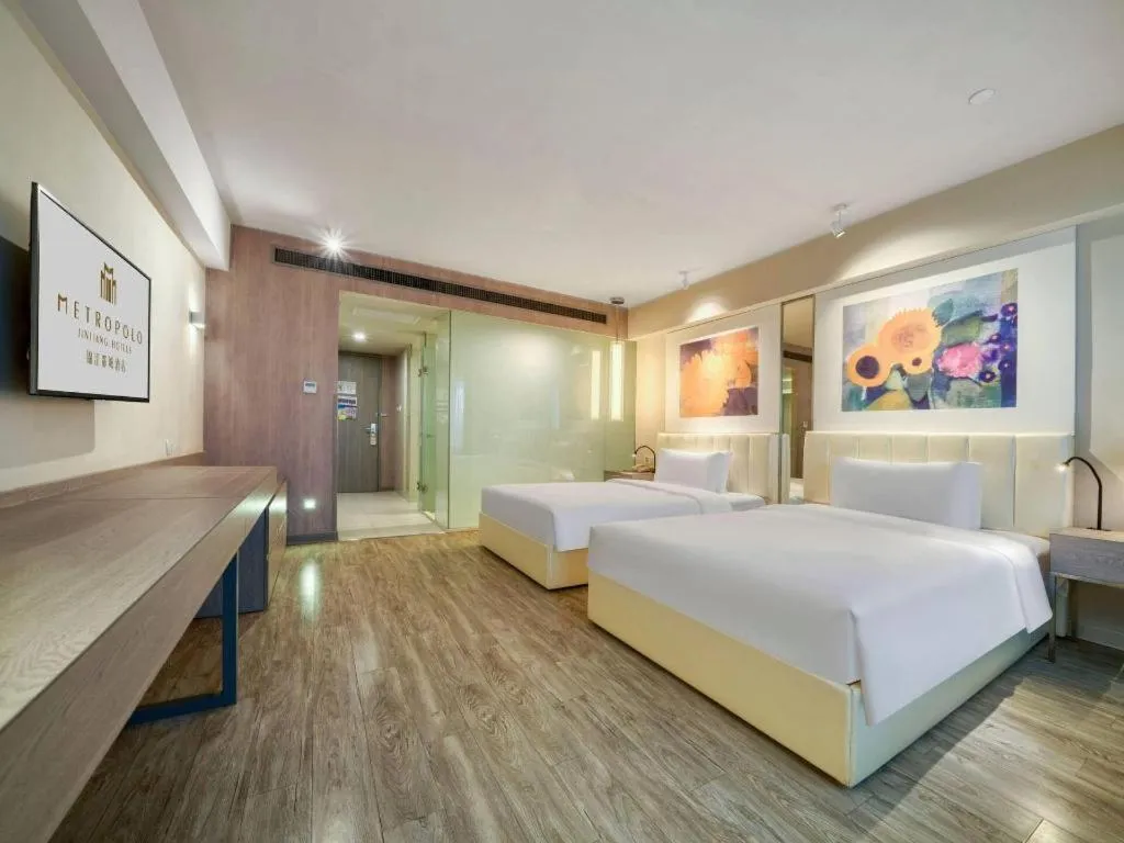 Bed in Jinjiang Metropolo Hotel - Hangzhou Xiasha