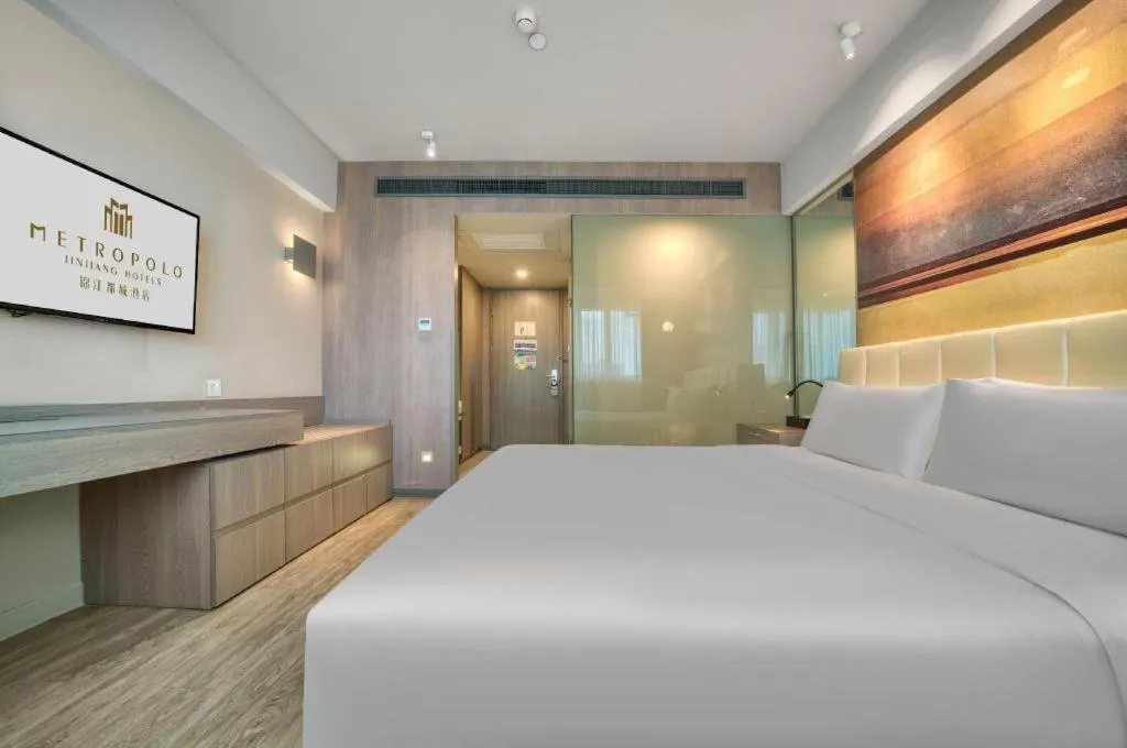 Bed in Jinjiang Metropolo Hotel - Hangzhou Xiasha