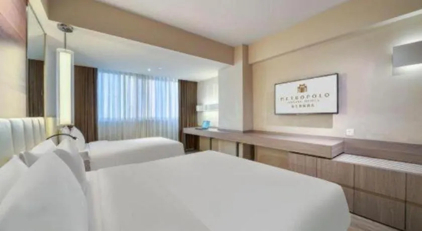 Bed in Jinjiang Metropolo Hotel - Hangzhou Xiasha