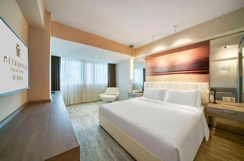 Bed in Jinjiang Metropolo Hotel - Hangzhou Xiasha
