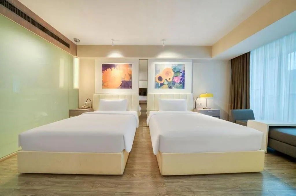 Bed in Jinjiang Metropolo Hotel - Hangzhou Xiasha