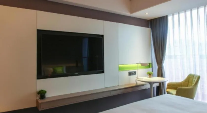 Bed in ibis Styles Yangzhou Baixiang Rd Hotel