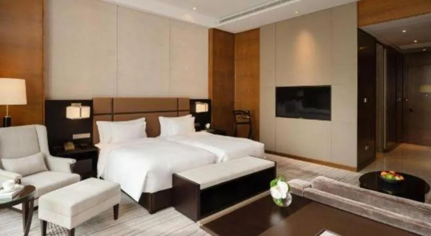 Bed in Fortune Grove Hotel Beijing