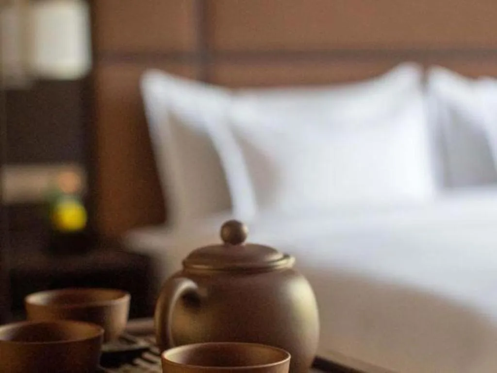 Bed in Fortune Grove Hotel Beijing