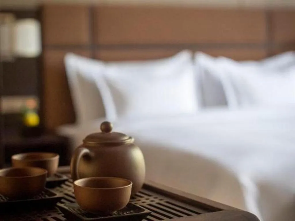 Bed in Fortune Grove Hotel Beijing