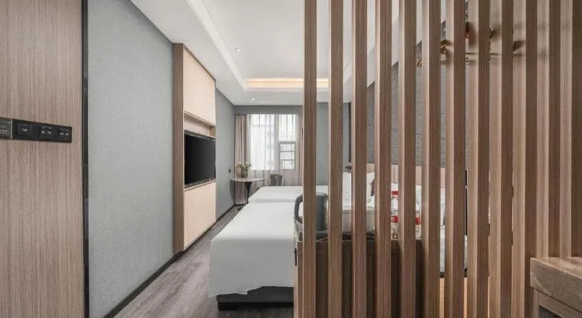 Bed in ibis Styles Dongguan Chang-an Wanda Plaza Hotel