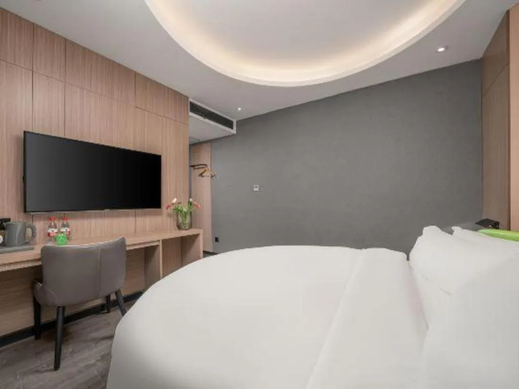 Bed in ibis Styles Dongguan Chang-an Wanda Plaza Hotel