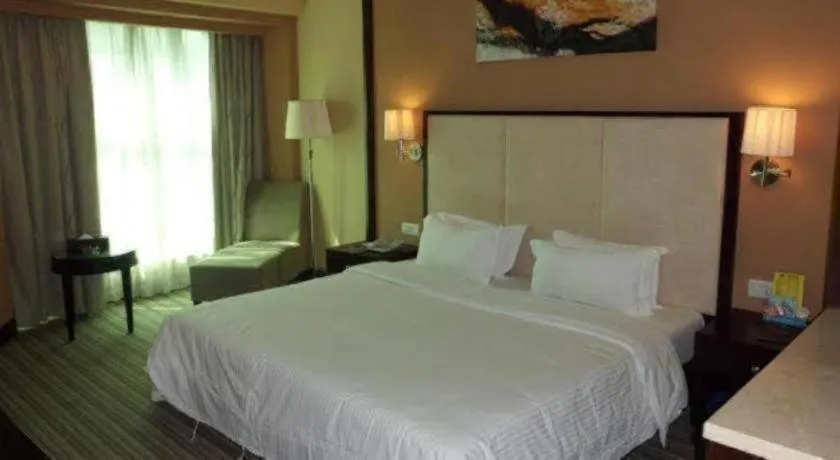 Bed in ibis Styles Dongguan Chang-an Wanda Plaza Hotel