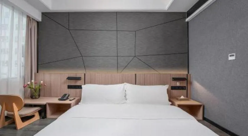 Bed in ibis Styles Dongguan Chang-an Wanda Plaza Hotel