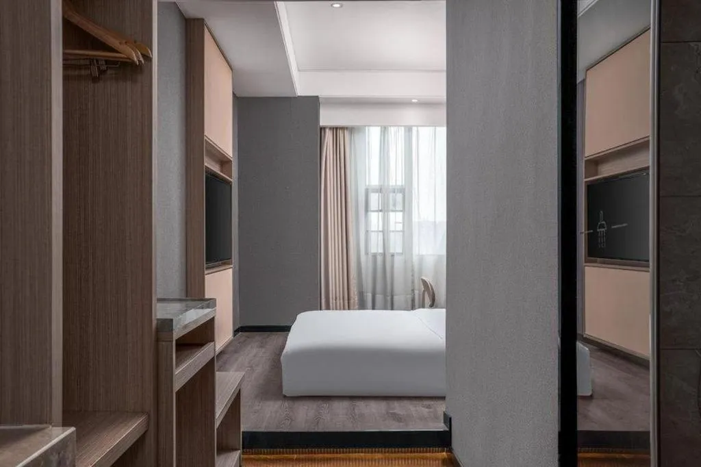 Bed in ibis Styles Dongguan Chang-an Wanda Plaza Hotel