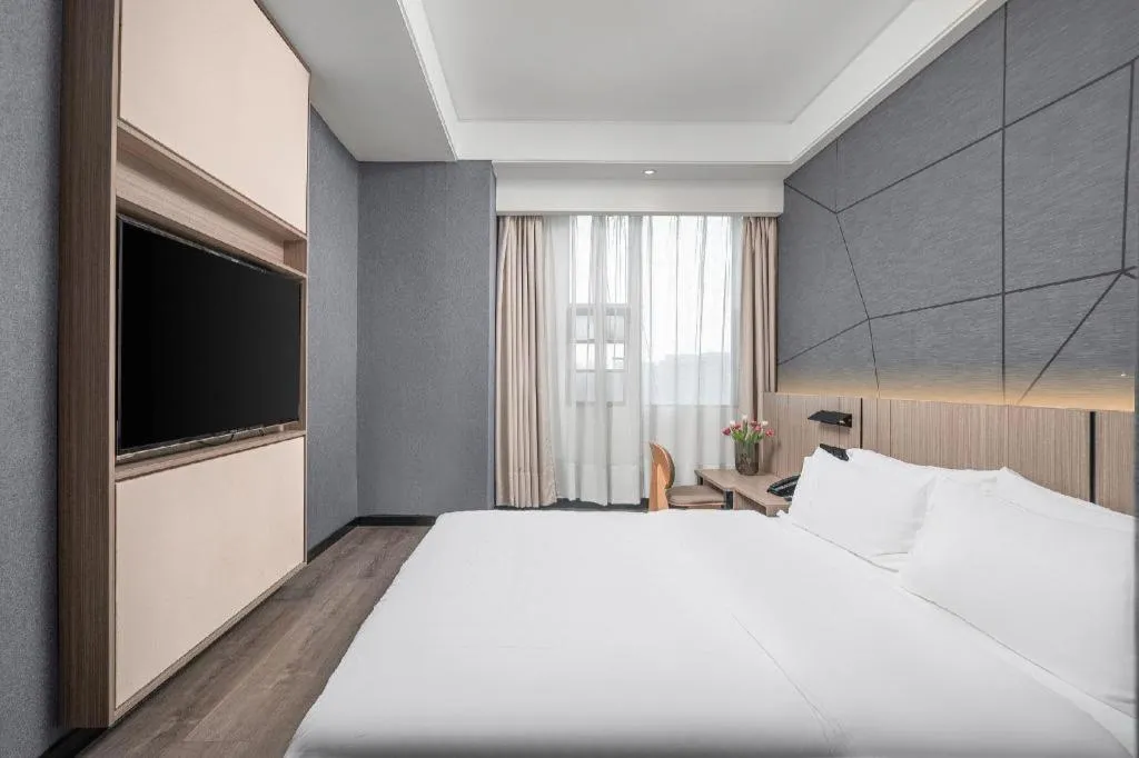 Bed in ibis Styles Dongguan Chang-an Wanda Plaza Hotel