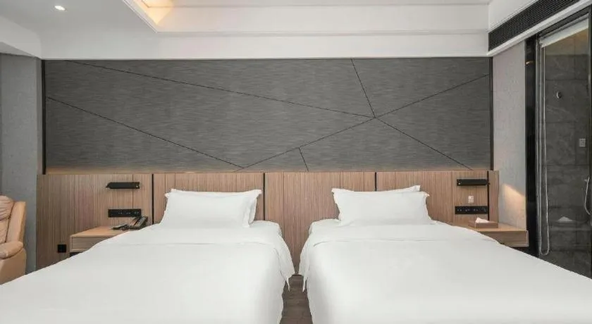 Bed in ibis Styles Dongguan Chang-an Wanda Plaza Hotel
