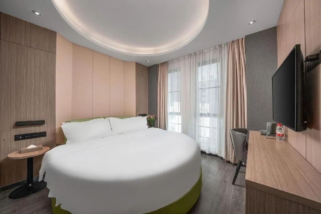 Bed in ibis Styles Dongguan Chang-an Wanda Plaza Hotel