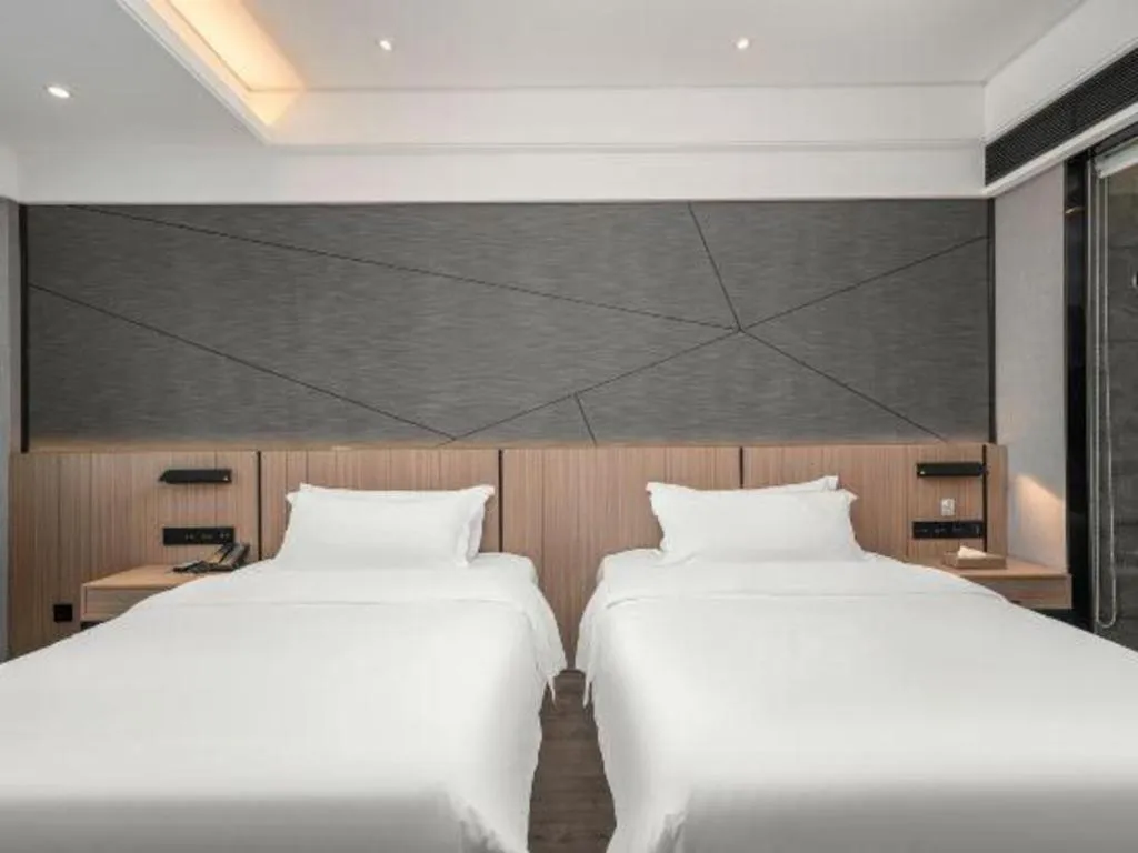Bed in ibis Styles Dongguan Chang-an Wanda Plaza Hotel