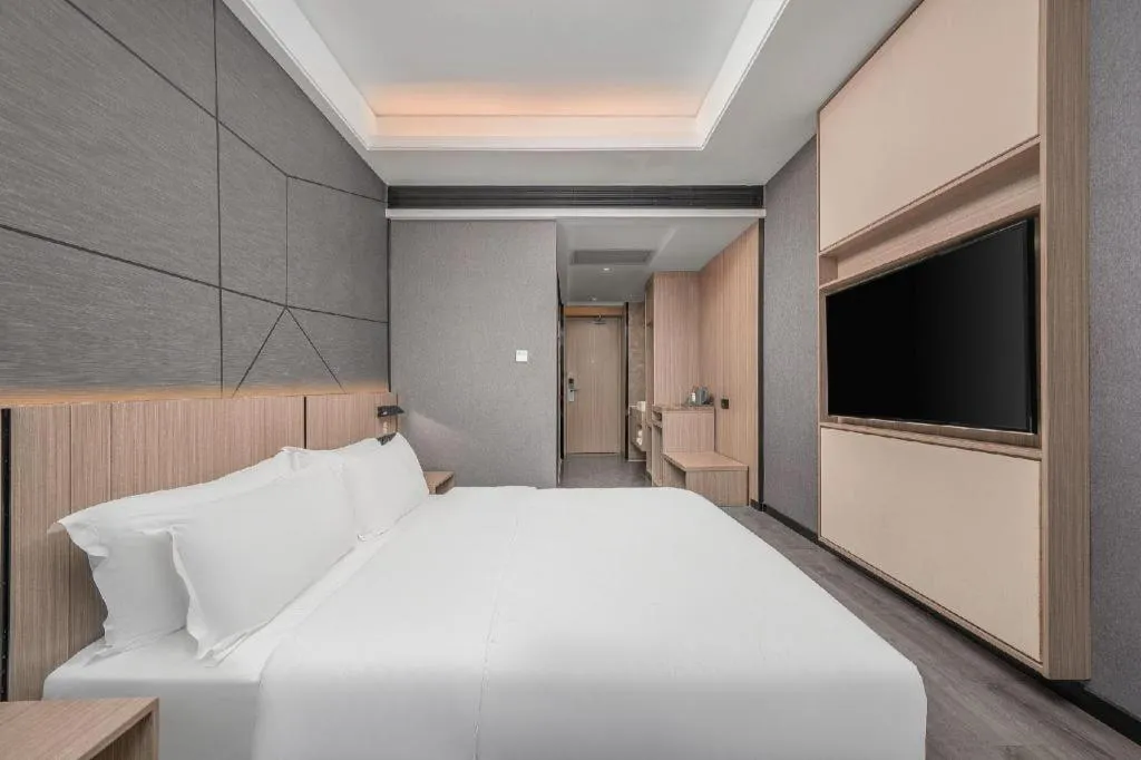 Bed in ibis Styles Dongguan Chang-an Wanda Plaza Hotel