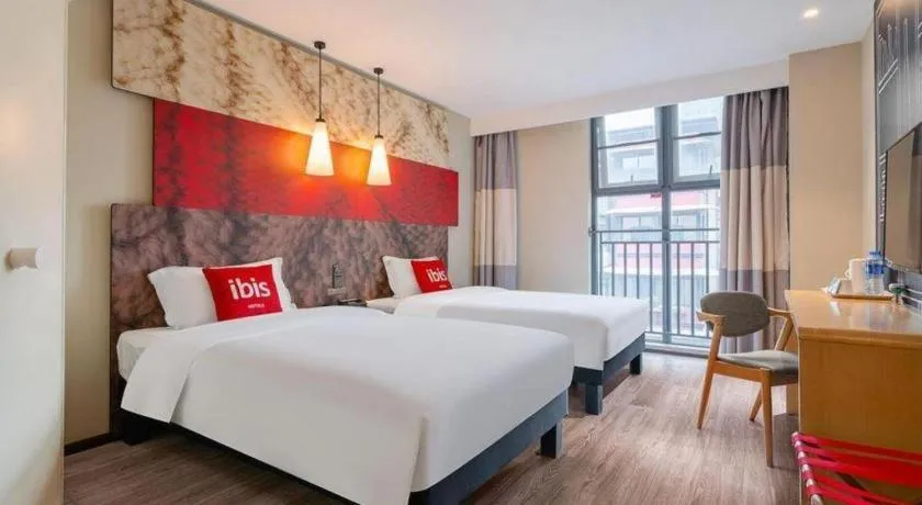 Bed in ibis Chengdu East Railway Station Hotel