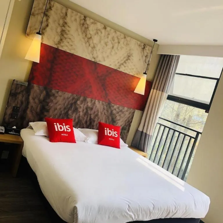 Bed in ibis Chengdu East Railway Station Hotel