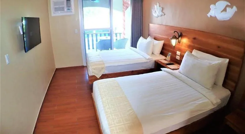 Bed in Roman Empire Panglao Boutique Resort