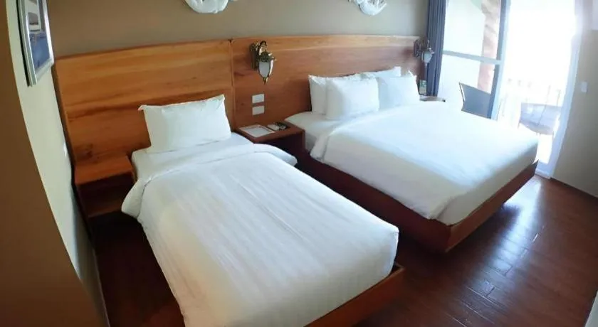 Bed in Roman Empire Panglao Boutique Resort