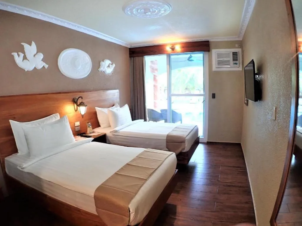 Bed in Roman Empire Panglao Boutique Resort