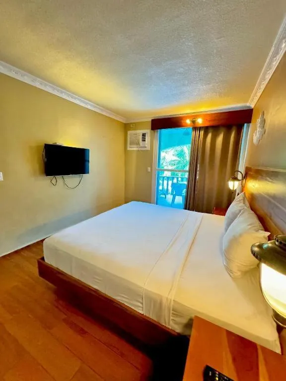 Bed in Roman Empire Panglao Boutique Resort